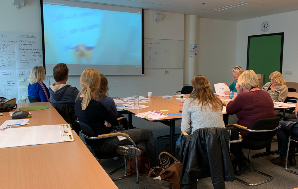 ergocoaches volgen een training