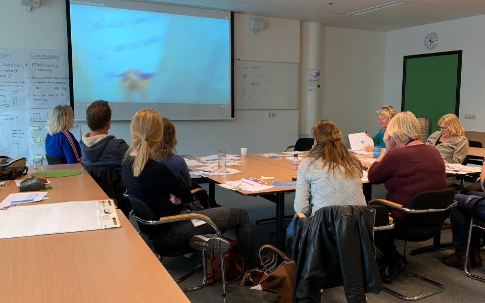 ergocoaches volgen een training